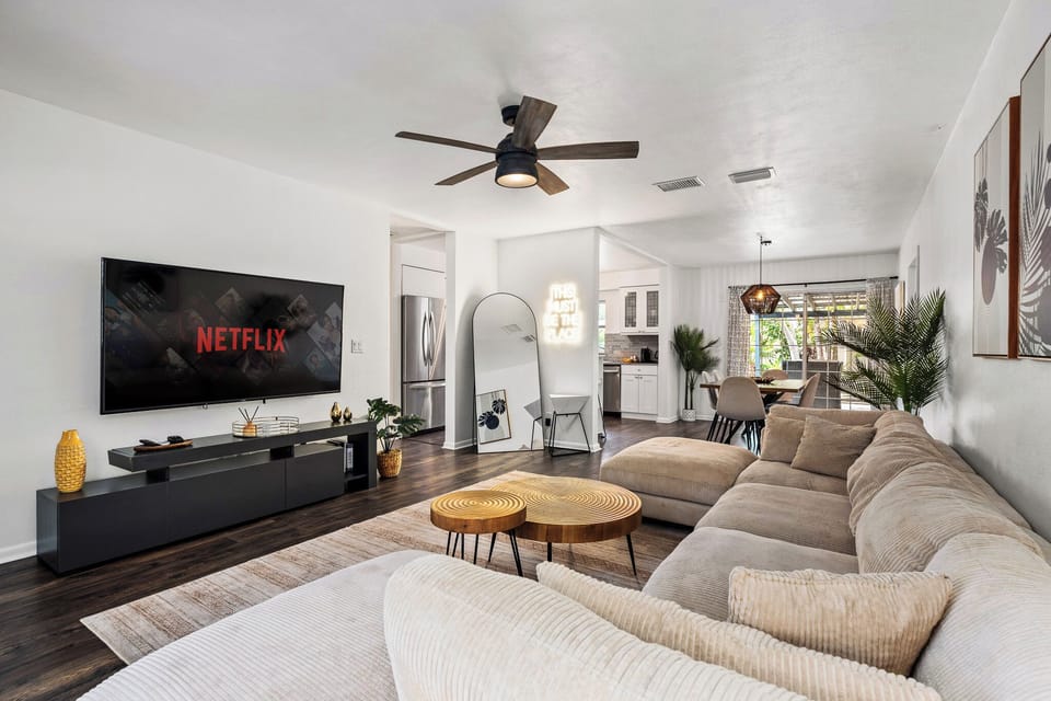 Relax on the sectional and enjoy the 70" Smart TV after exploring!