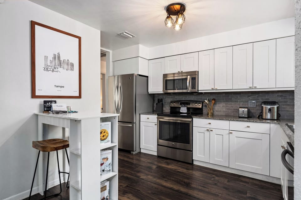 Modern kitchen stocked for home-cooked meals.