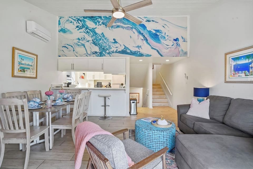 Light-filled and welcoming. Stretch out on the sofa, stream a movie, or open the doors and let the ocean air roll in.