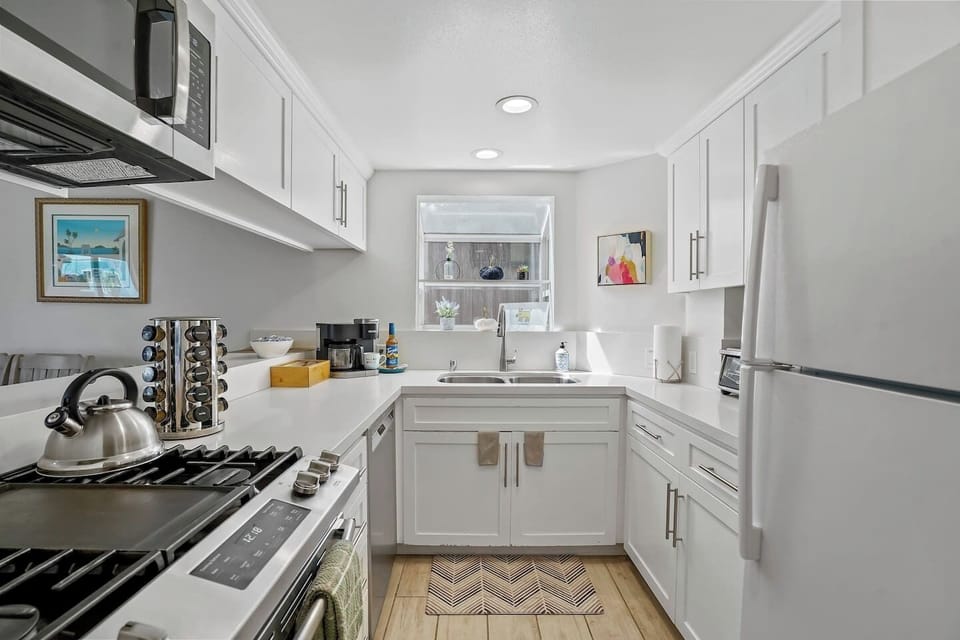 A second look at the heart of the home. Ample counter space, modern appliances, and room to gather.
