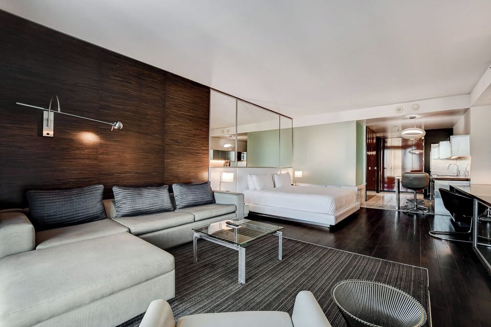 Deluxe Studio Suite, City View | Living area | 42-inch LED TV with digital channels