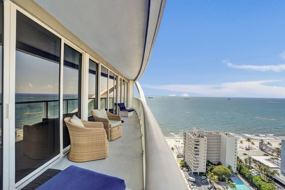 Balcony overlooking the beach and ocean for sunrise coffee or evening wine.