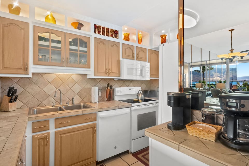 Condo, Multiple Beds, Lanai, Ocean View (Menehune Shores 606) | Private kitchen | Coffee/tea maker