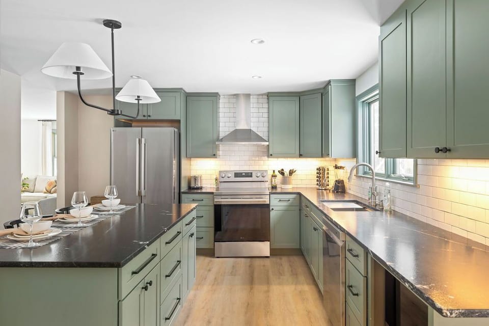 Newly renovated family kitchen with expansive prep space and oversized island - perfect for shared meals, wine tastings and gathering before mountain adventures.