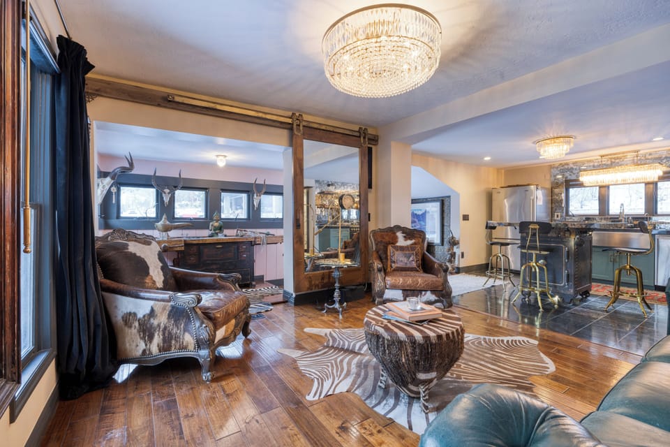 Living room with contemporary design and plush sofa.