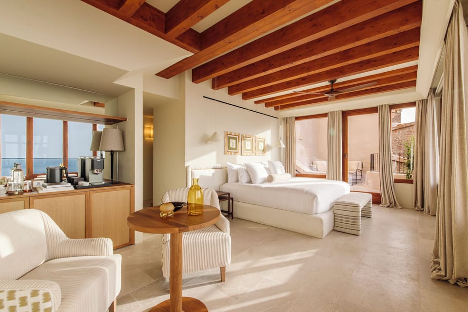 Deluxe Suite, Terrace, Sea View | Premium bedding, minibar, in-room safe, desk