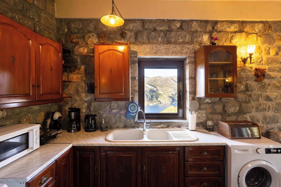A kitchen with modern amenities and rustic charm