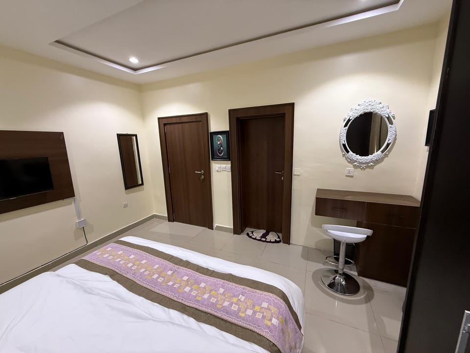 Deluxe Apartment, Balcony, City View | Desk, laptop workspace, blackout drapes, soundproofing