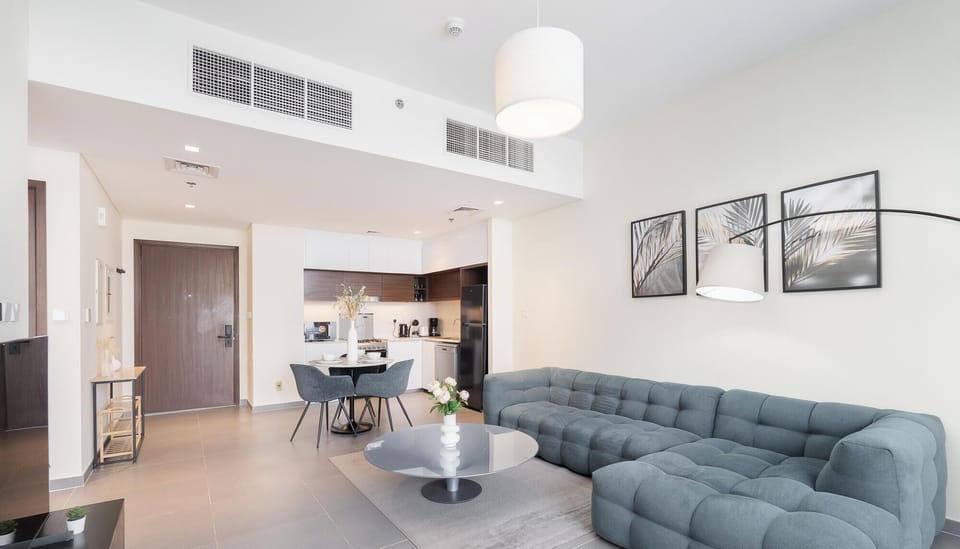 Luxury Apartment, Balcony, Harbor View | Living area | 65-inch Smart TV with cable channels