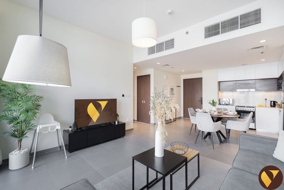 Luxury Apartment, Balcony, Harbor View | Living area | 65-inch Smart TV with cable channels