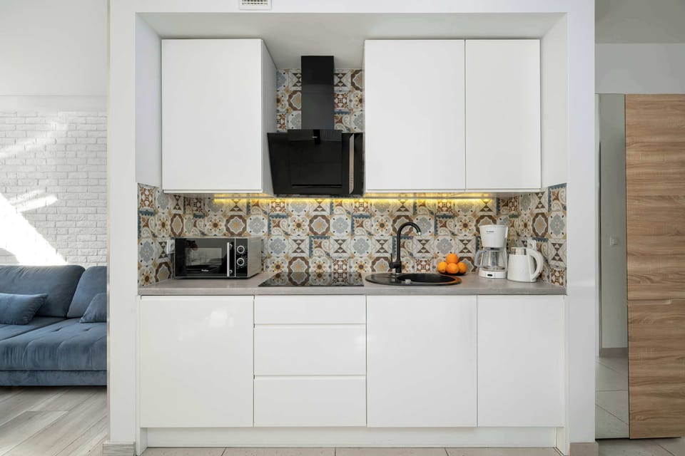 The kitchenette's practical layout maximizes space and functionality.
