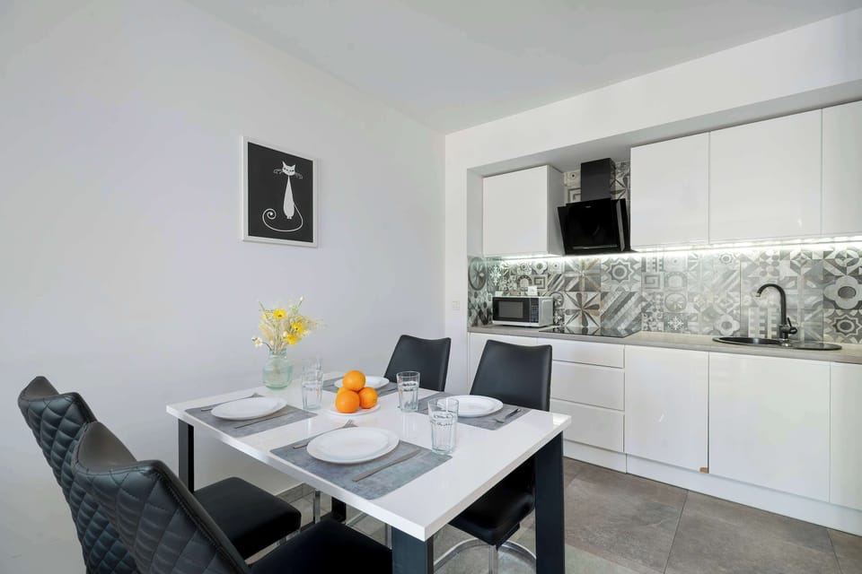 The kitchenette's practical layout maximizes space and functionality.