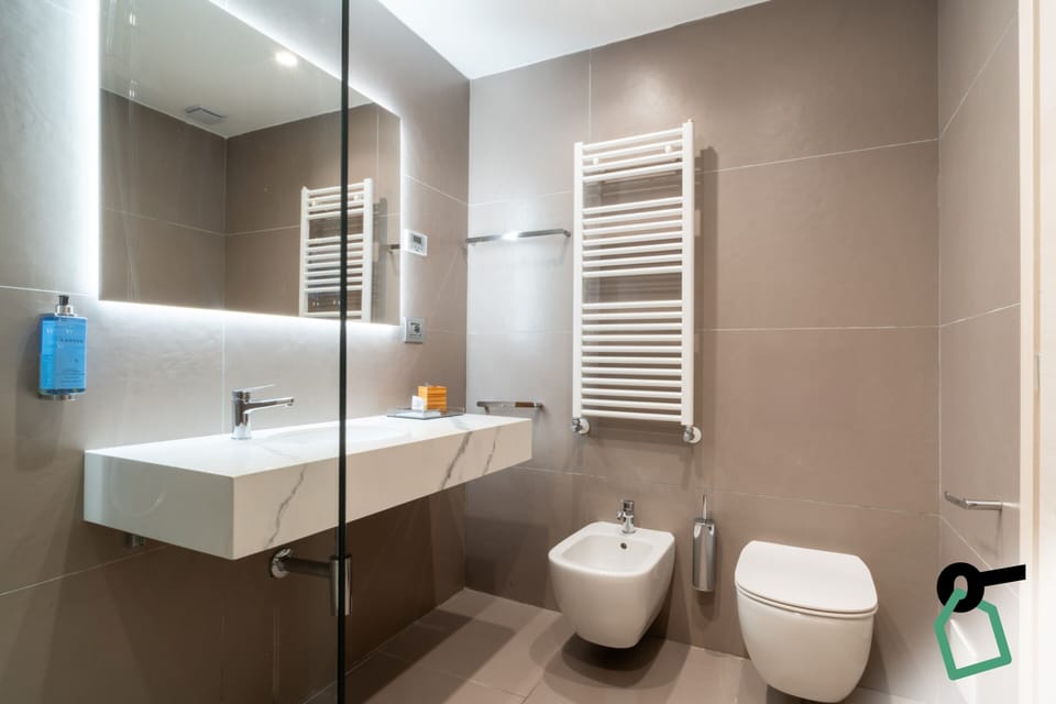 Standard Double or Twin Room | Bathroom | Shower, hair dryer, towels, toilet paper
