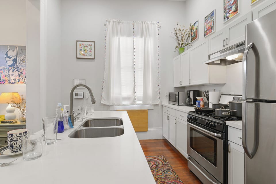 Kitchen- Island w/seating, stainless steel appliances, coffee products provided