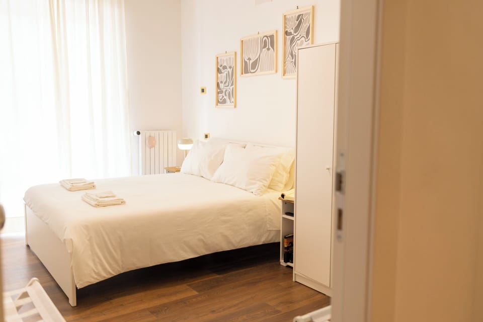 Premium bedding, down comforters, memory foam beds, free minibar