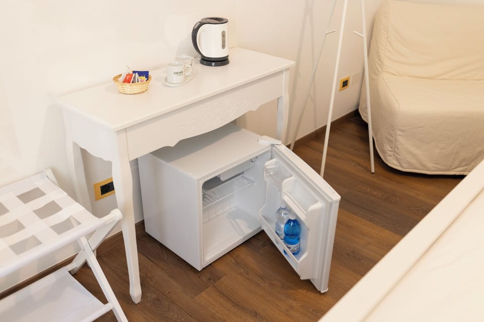 Premium bedding, down comforters, memory foam beds, minibar (free items)