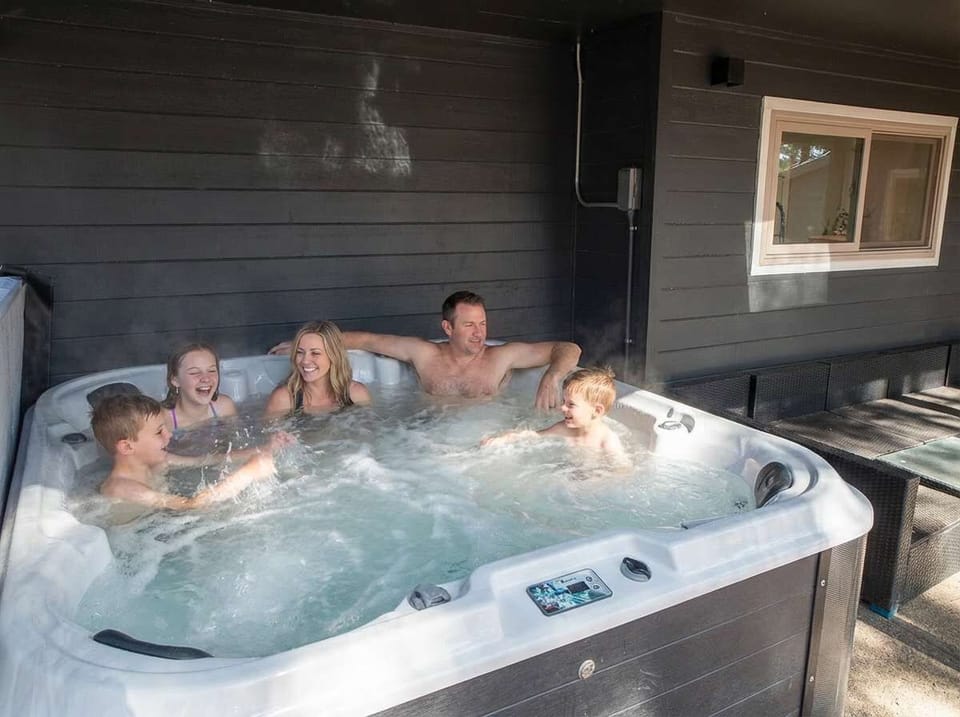Daytime dips, sunset soaks, or starlit chats—our hot tub is basically vacation therapy.
