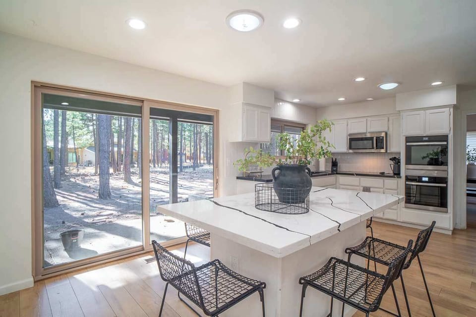 Cook, snack, sip, repeat. This kitchen is your happy place for morning coffee, midnight cravings, and everything delicious in between. Aprons optional; good times guaranteed.