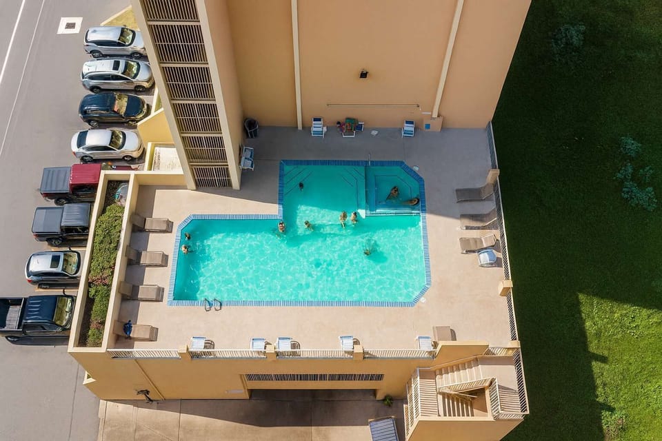Take a dip in the sparkling pool or unwind in the tub at Inverness. This beachfront oasis features plenty of lounge chairs, sunning space, and easy access to both the sand and surf—perfect for families and relaxing coastal getaways.