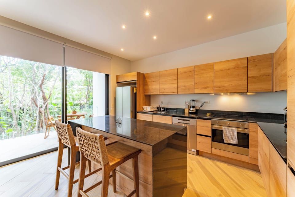 Deluxe Condo, Patio, Resort View | Private kitchen | Toaster, highchair