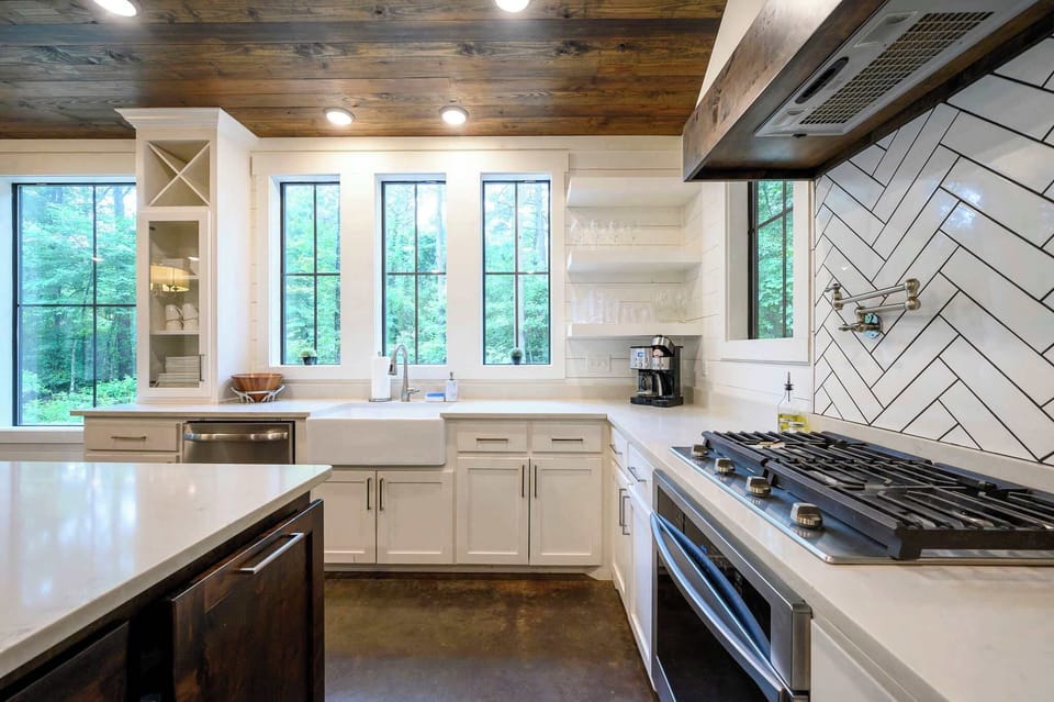 Whether you’re whipping up a gourmet breakfast or enjoying a casual glass of wine, our chef-inspired kitchen makes every meal feel like a special occasion. Modern amenities meet warm, rustic design for the perfect culinary retreat.