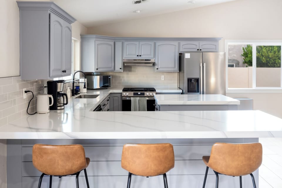 High-end appliances and thoughtful finishes throughout the kitchen