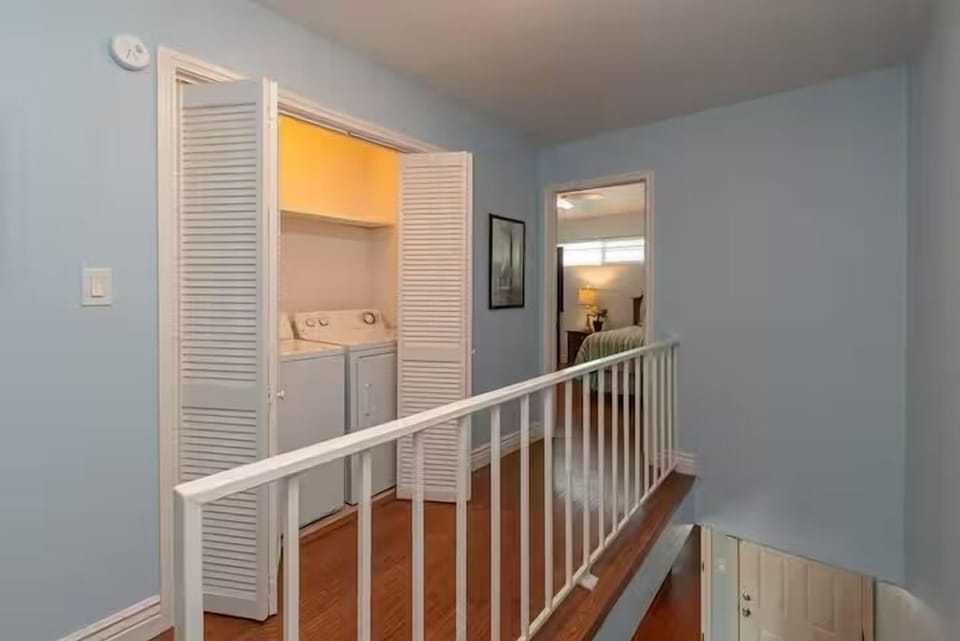 Washer and dryer are upstairs between bedrooms 2 and 3.