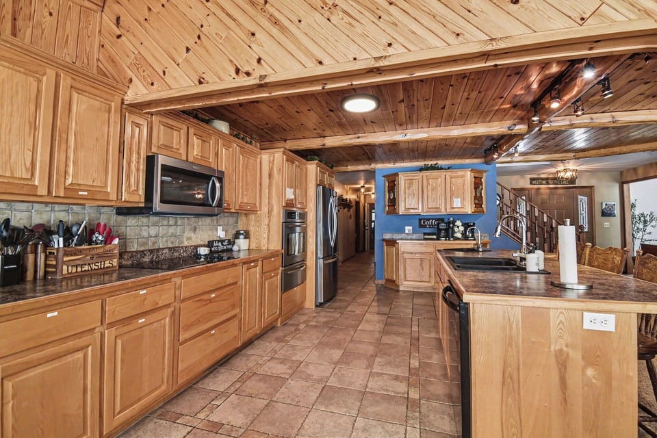 Kitchen is fully stocked up with pans, dishes, and everything needed for cooking