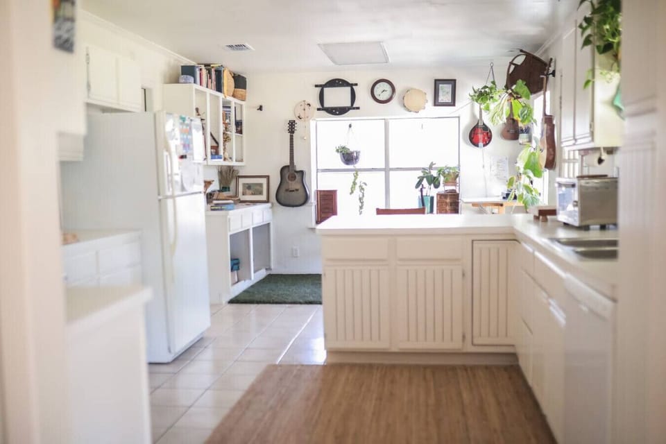Full kitchen with oven, stove, microwave, dishwasher, toaster oven, and pour‑over coffee setup—fuel your adventures and artistry.