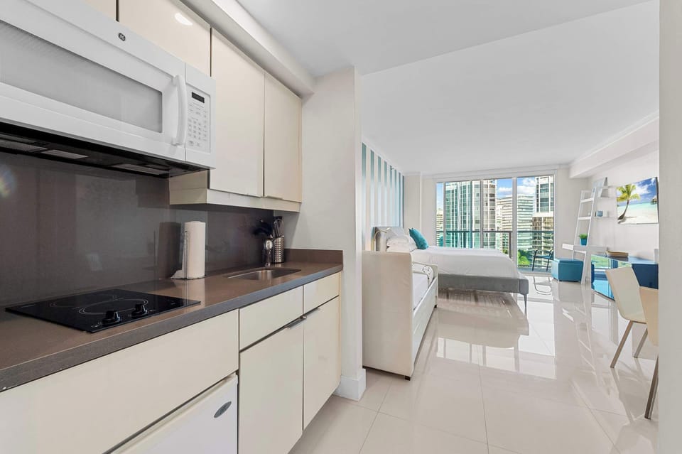 Fully equipped modern white kitchen interior