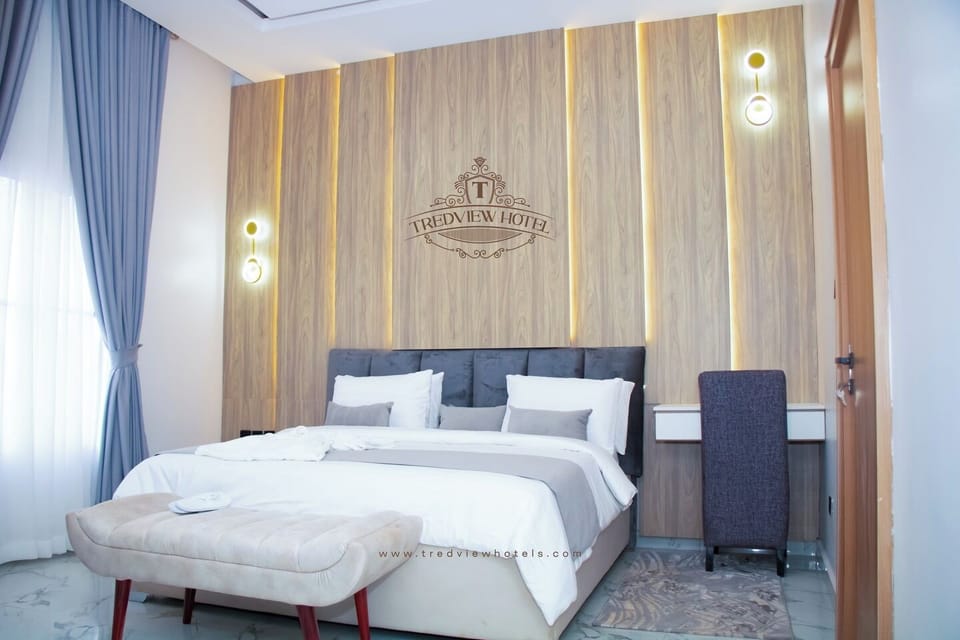 Economy Room, Balcony, City View | In-room safe, desk, laptop workspace, blackout drapes