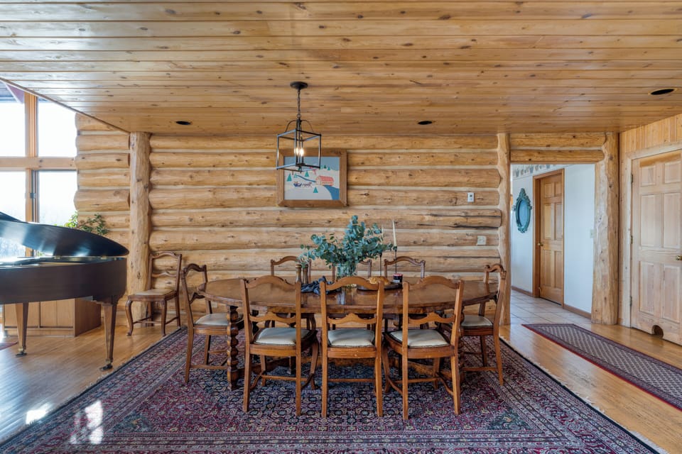 Close-up of a rustic wooden dining table.