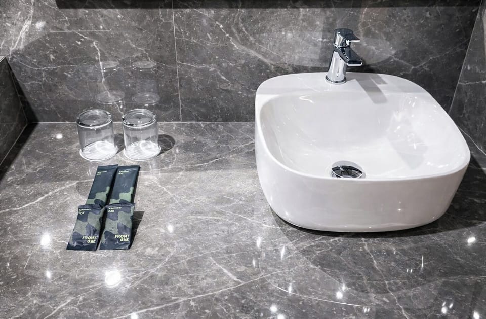 Junior Double Room | Bathroom | Shower, hair dryer, towels, soap
