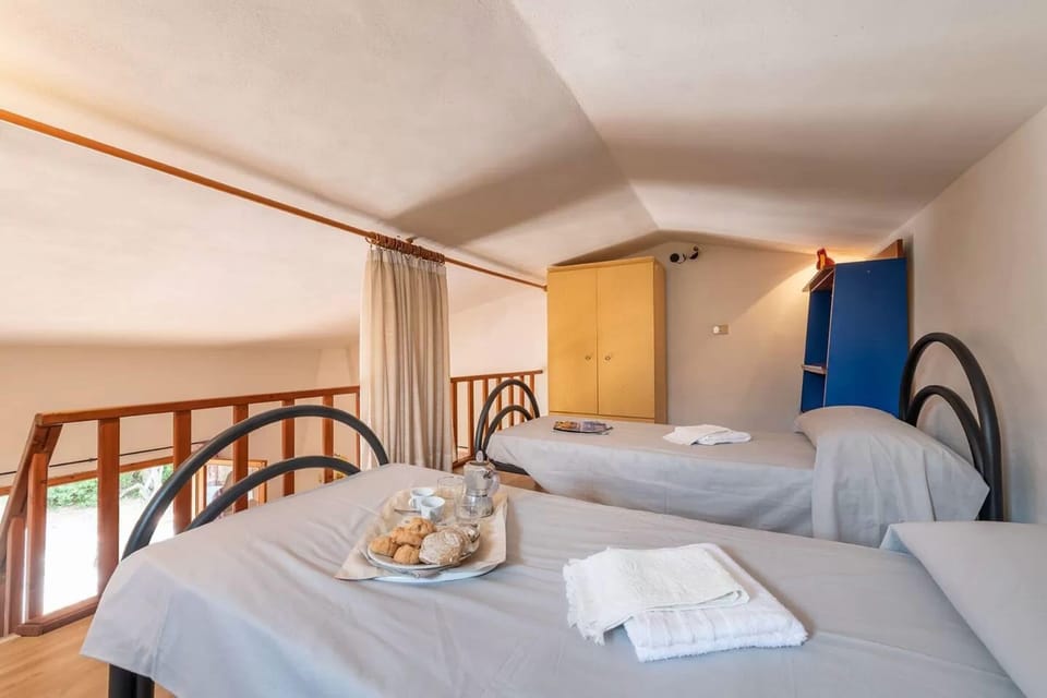 Apartment, 2 Bedrooms, Patio, Garden View | Dining