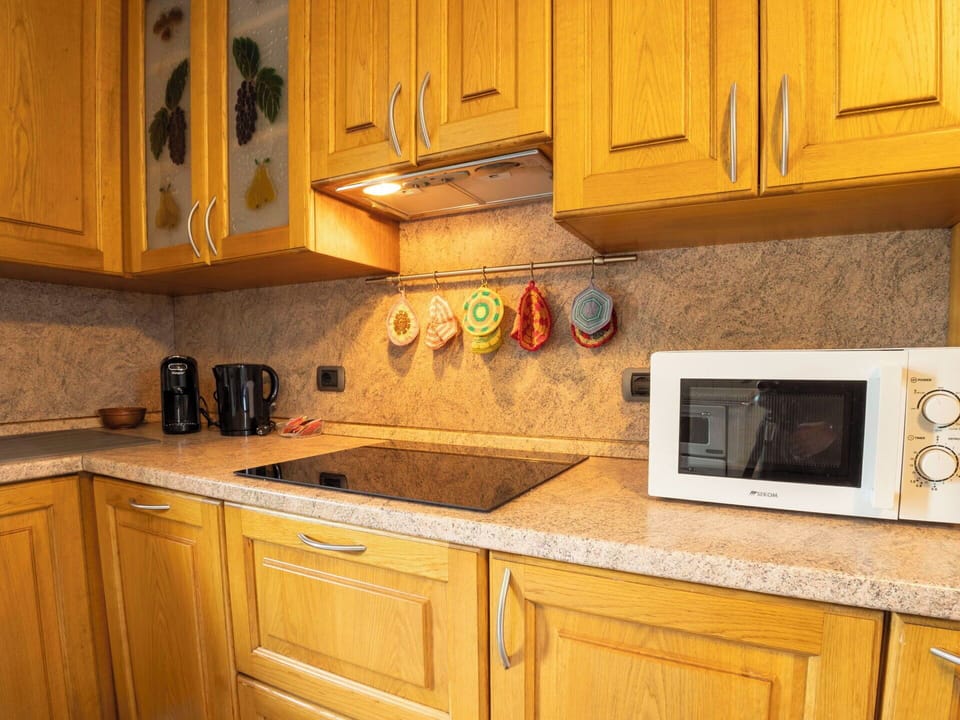 Kitchen, Countertop, Kitchen Appliance, Cabinetry, Major Appliance, Wood, Kitchen Sink, Yellow, Flooring, Interior Design