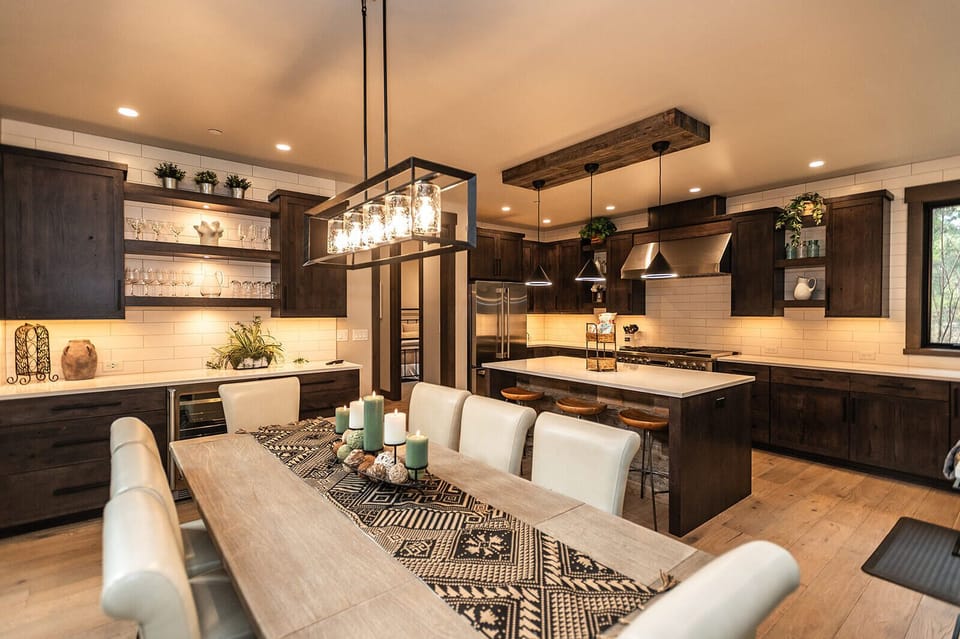 A chef’s kitchen designed for gathering — meals, memories, and maybe a second bottle.