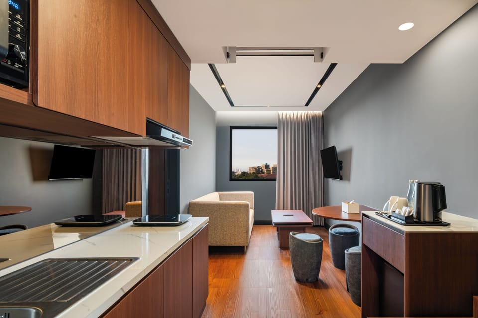 Suite, 1 King Bed | Private kitchenette | Microwave, electric kettle