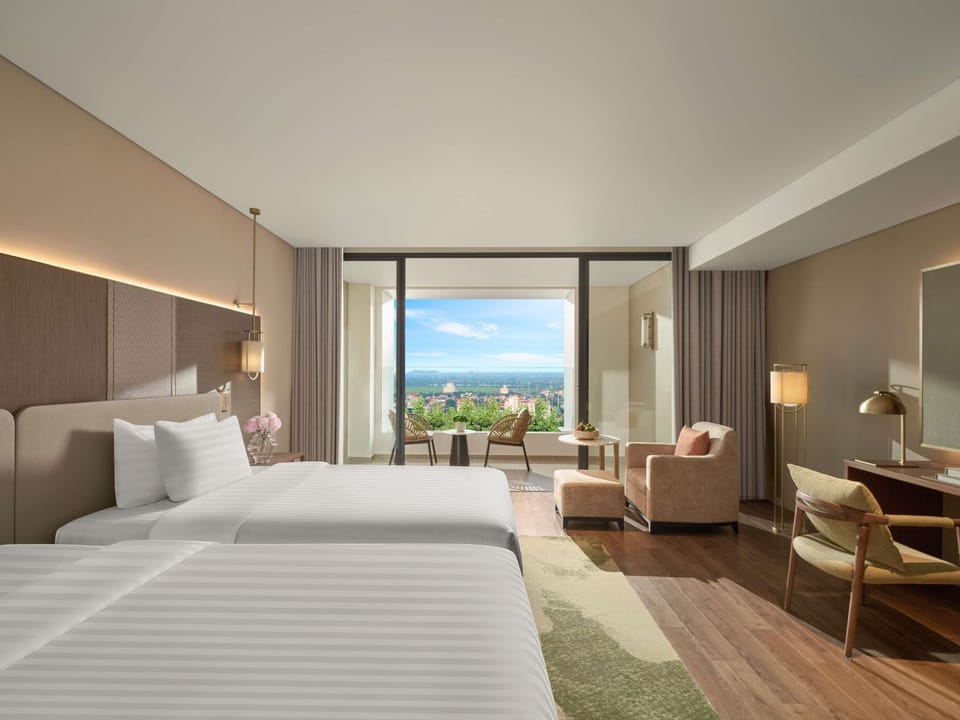 Premium bedding, free minibar items, in-room safe, desk