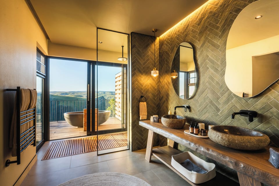 Luxury Suite, 2 Bedrooms | Bathroom | Deep soaking tub, rainfall showerhead, eco-friendly toiletries
