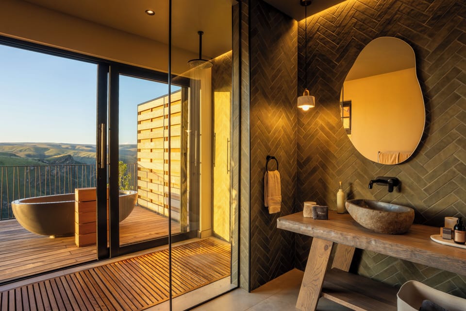 Luxury Suite, 2 Bedrooms | Bathroom | Deep soaking tub, rainfall showerhead, eco-friendly toiletries