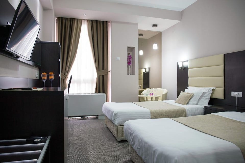 Blackout drapes, soundproofing, iron/ironing board, free WiFi
