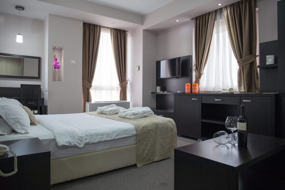 Superior Double Room, City View | Blackout drapes, soundproofing, iron/ironing board, free WiFi