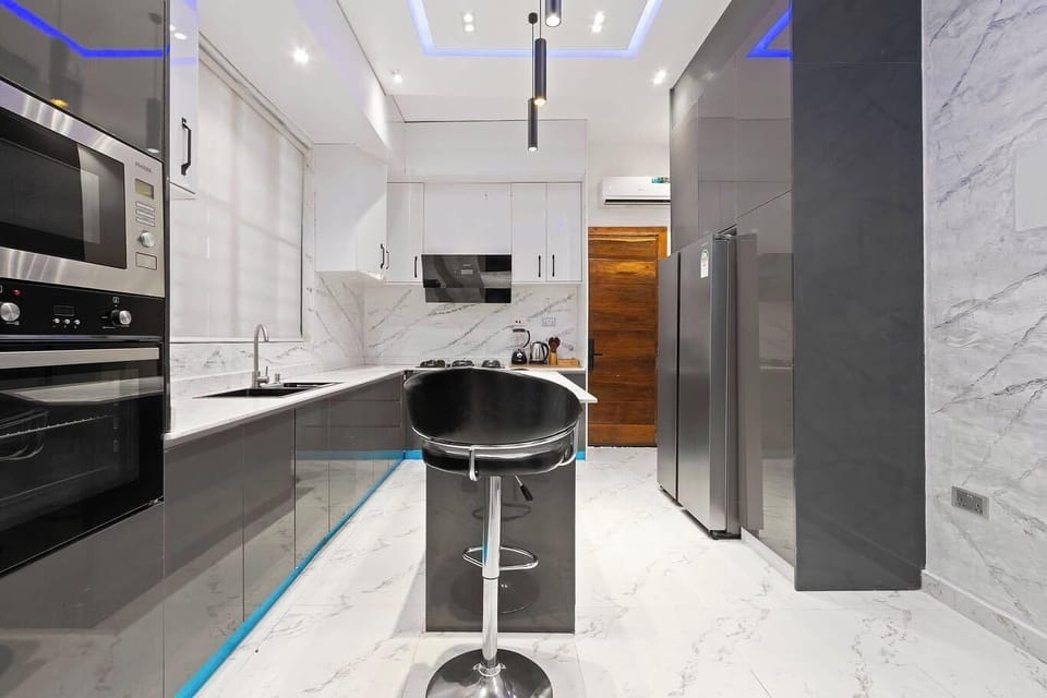 Economy Apartment, Balcony, City View | Private kitchen | Fridge, microwave, oven, stovetop