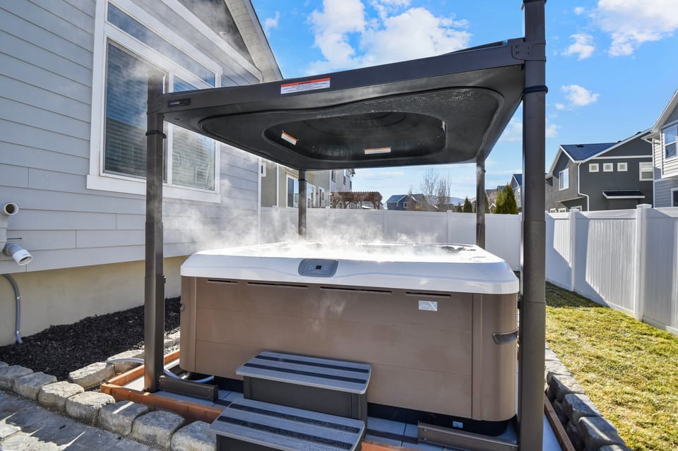 The private hot tub offers the perfect place to soak and relax.