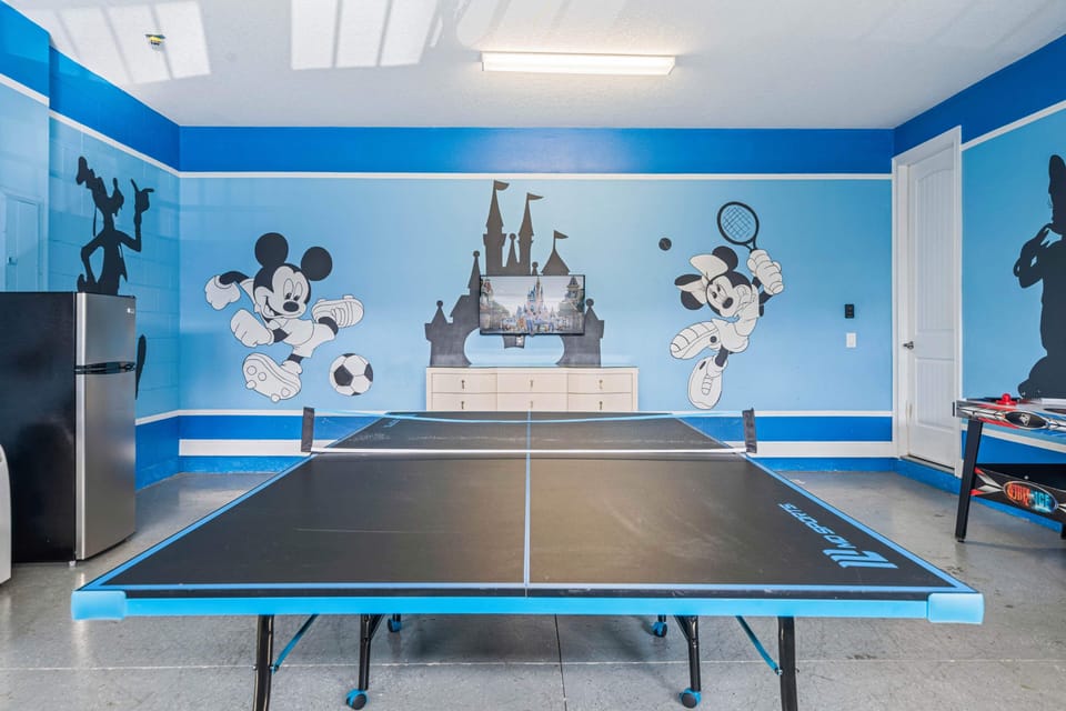 Enjoy game nights in the themed game room w/ ping pong table & fun wall art
