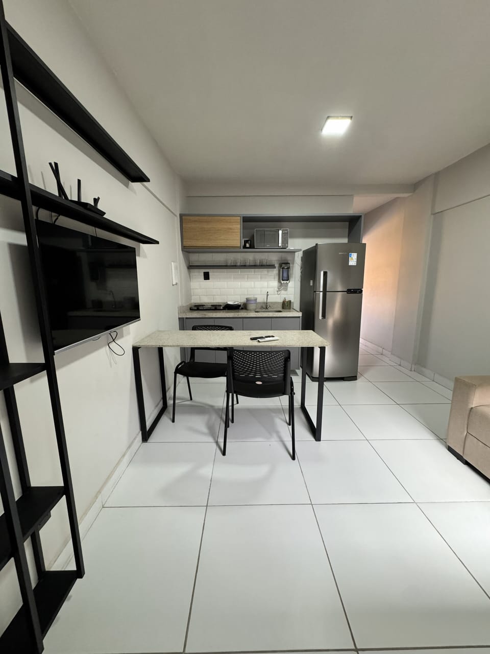 Full-size fridge, microwave, toaster, cookware/dishes/utensils