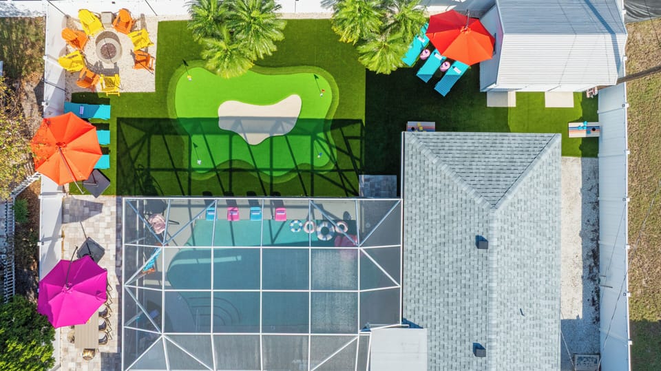 Private backyard with pool, putting green, and space to relax and play