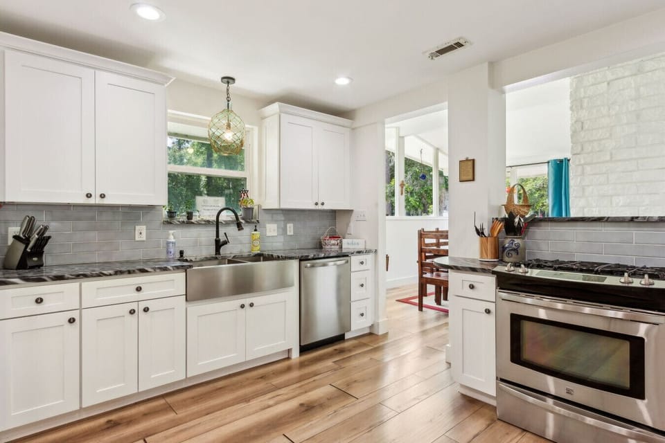 All stainless appliances in the clean kitchen.