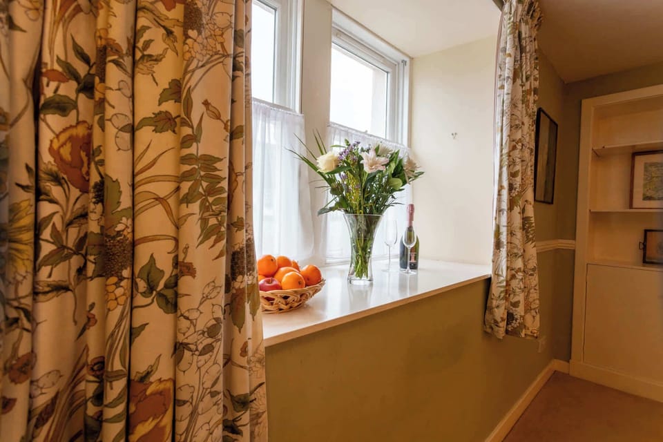 Natural light and countryside charm create a welcoming backdrop for slow mornings.