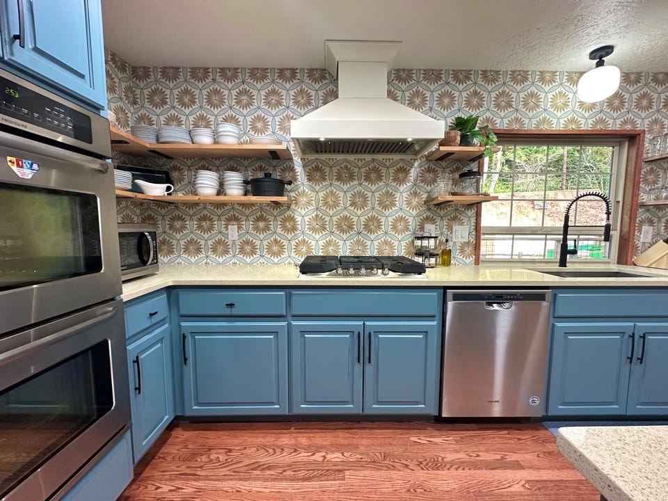 A large gas range (a second 2 burner portable cooktop), double ovens and all the cookware and bakeware you'll need to make delicious meals for even the largest groups.